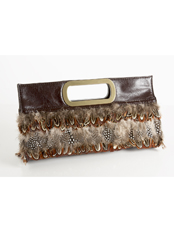 Super cool clutch feather accents gives it a unique look with out an outrageous price available at the Limited